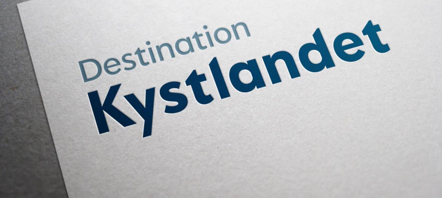 Brevhoved med Destination Kystlandet logo